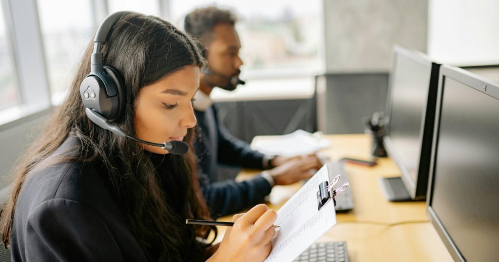 Customer support representative offering native language assistance