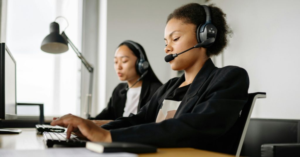 Female customer support agent showcasing a global outsourcing solution.