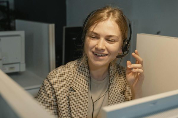 Professional customer support representative delivering outsourced call center services