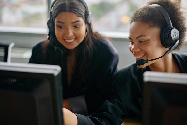 Call center agents collaborating delivering AI-driven customer service