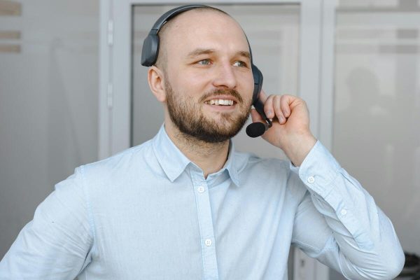 Customer service agent providing industry-specific customer service to clients