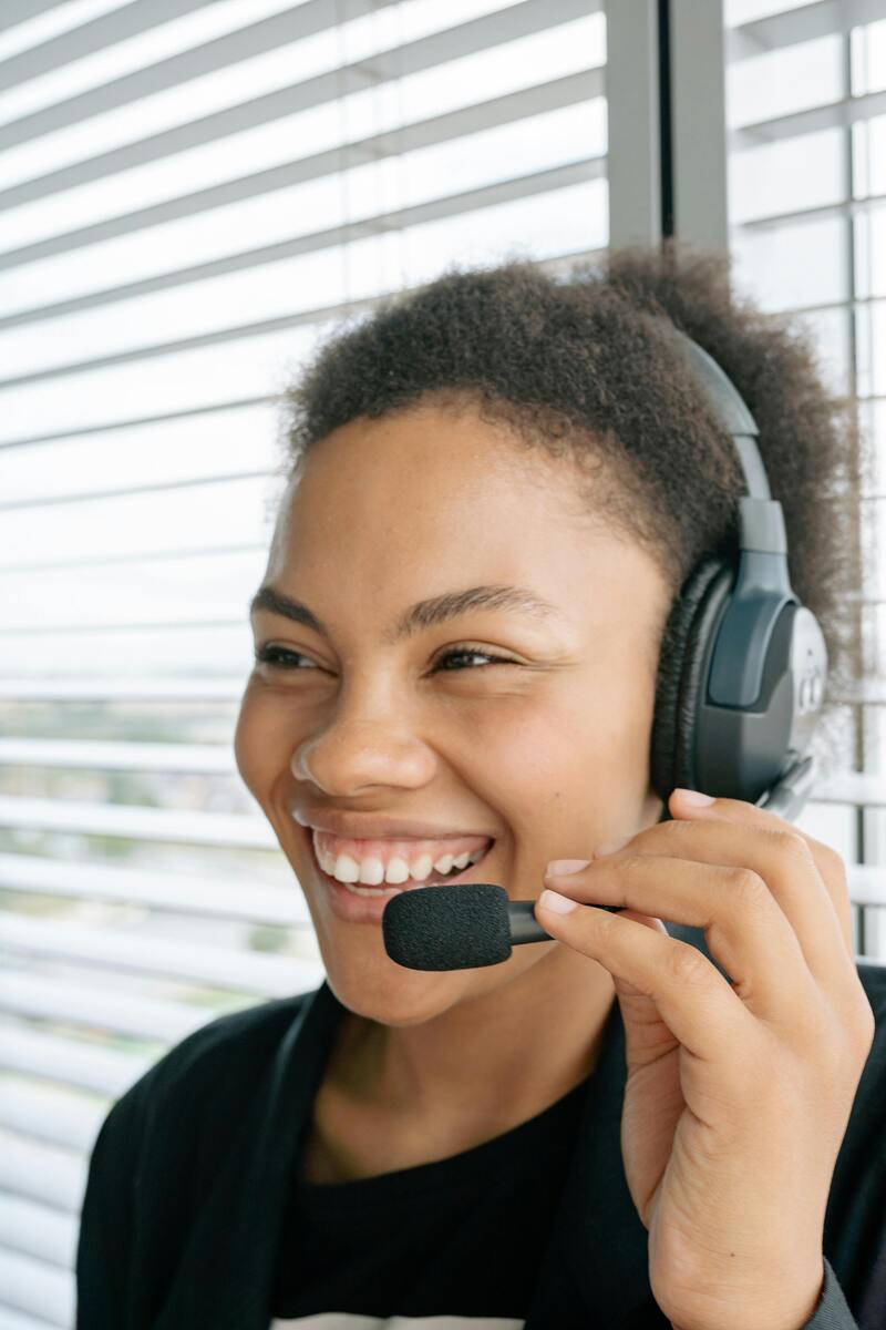 Call center agent handling calls as part of customer relationship management strategies