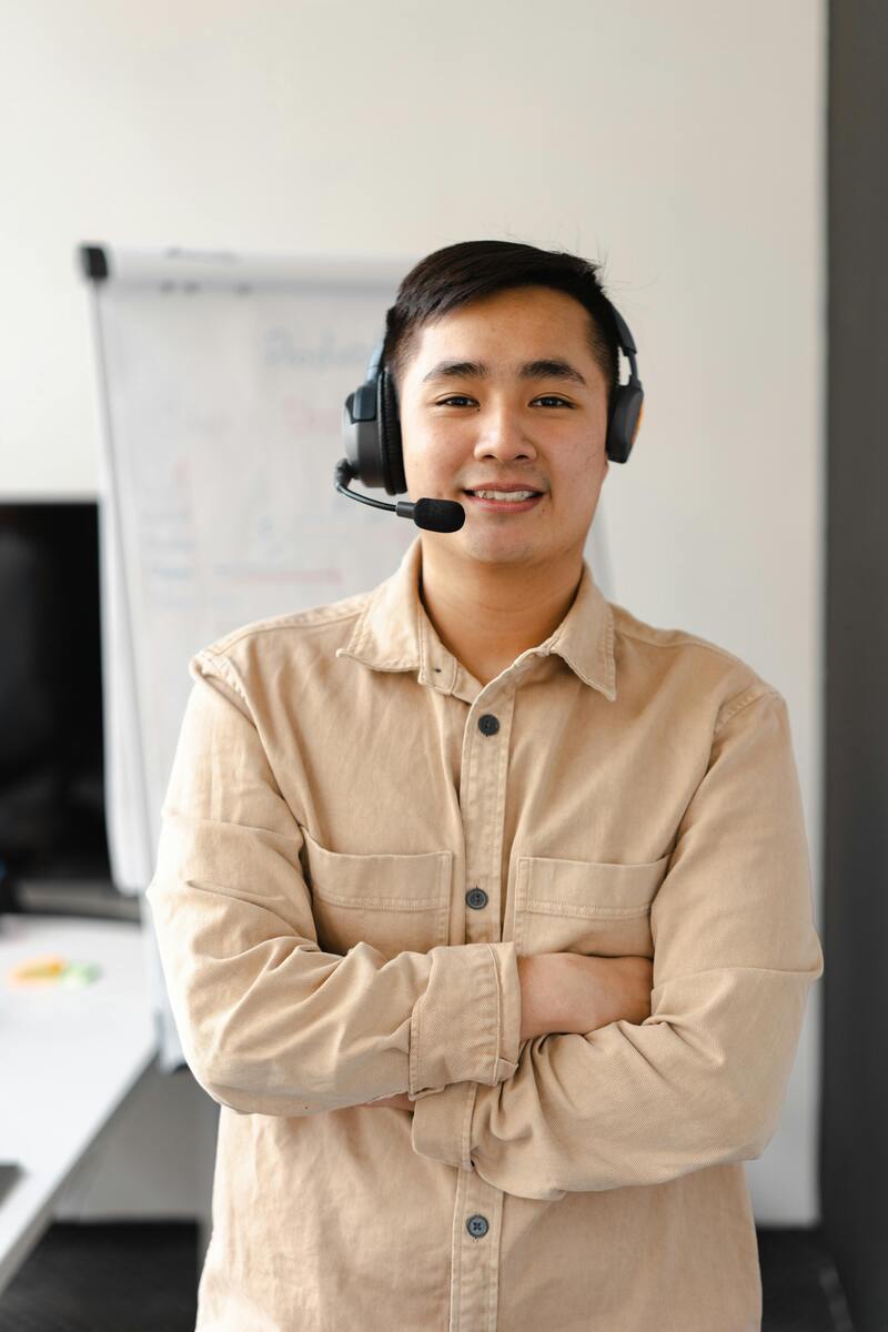 Call center agent working in office supporting outsourcing for business growth