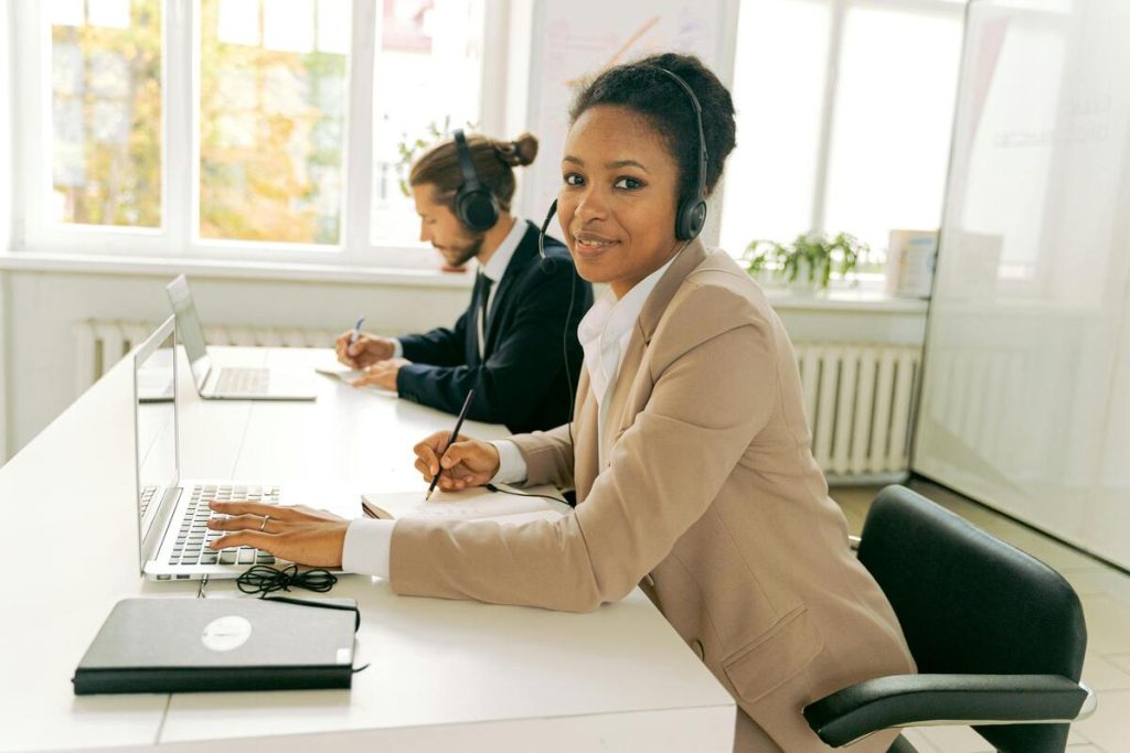 Call center agents providing small business tech support services to clients