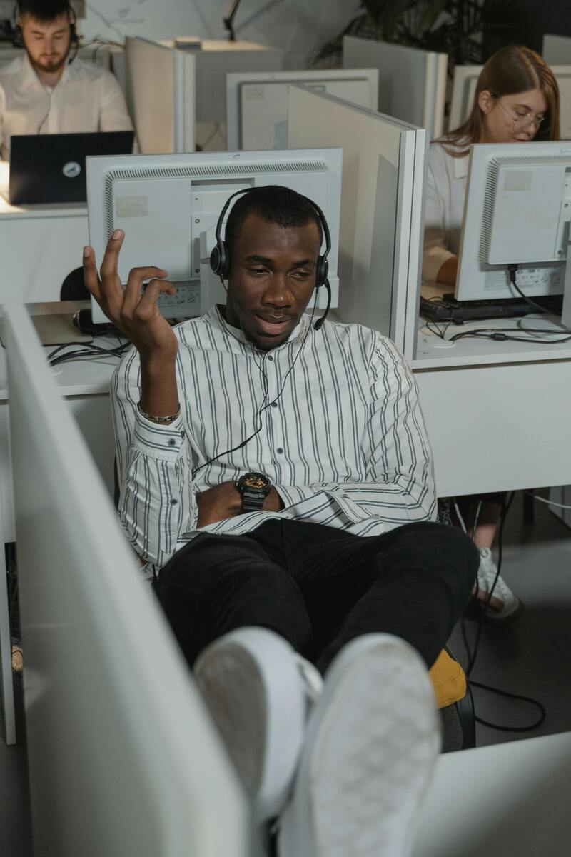 Customer service agent delivering outsourced customer care services over the phone