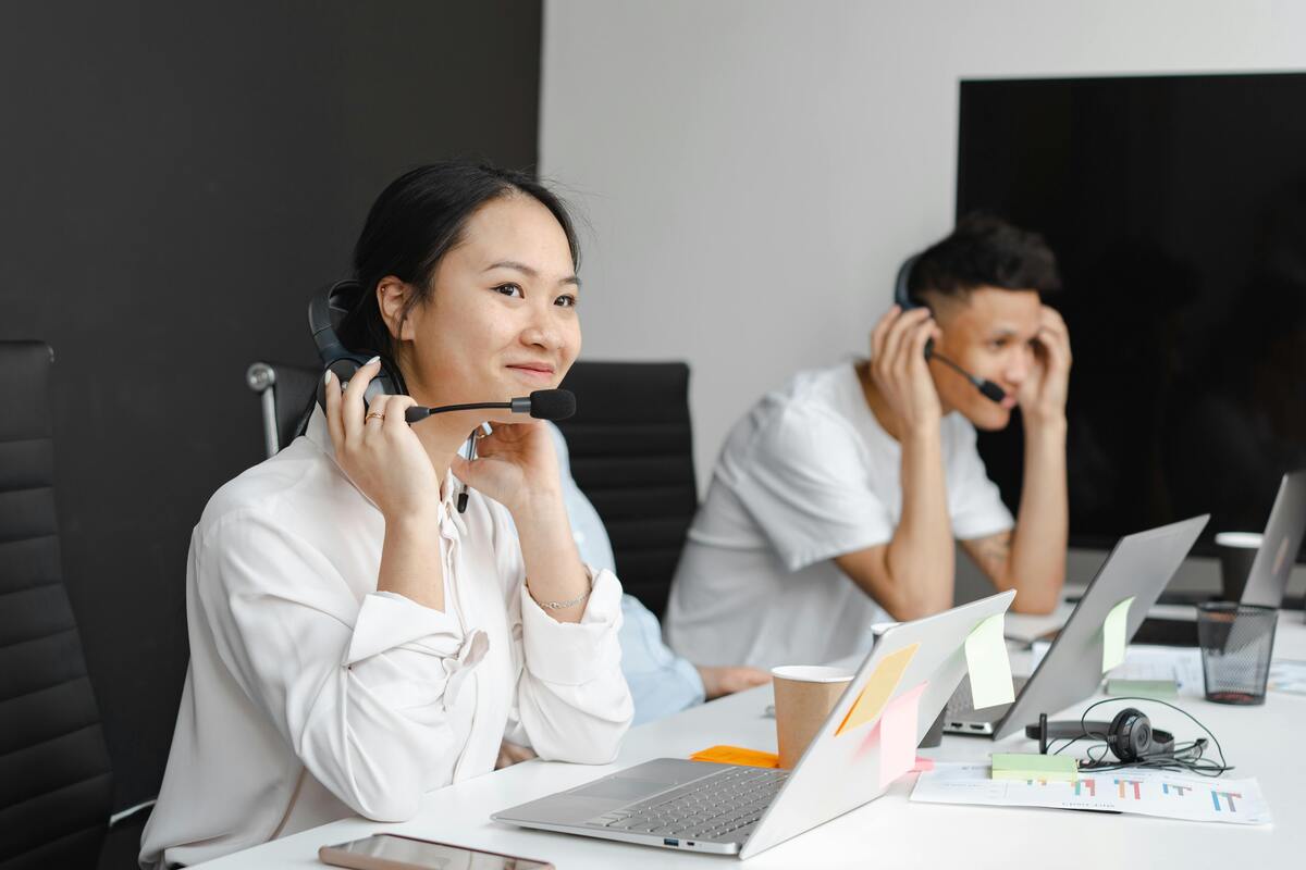 Customer support agents managing calls through an outsourced inbound call center