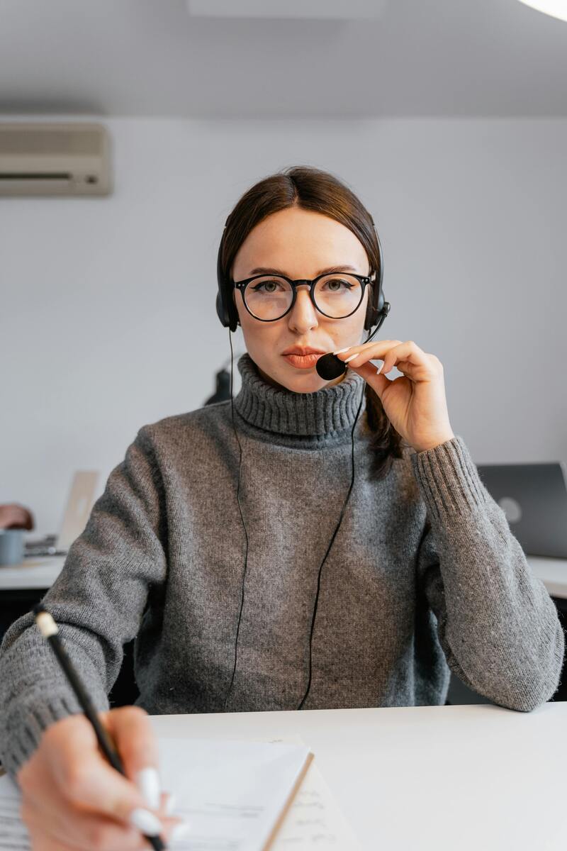 Customer service agent making calls for outbound call center for lead generation