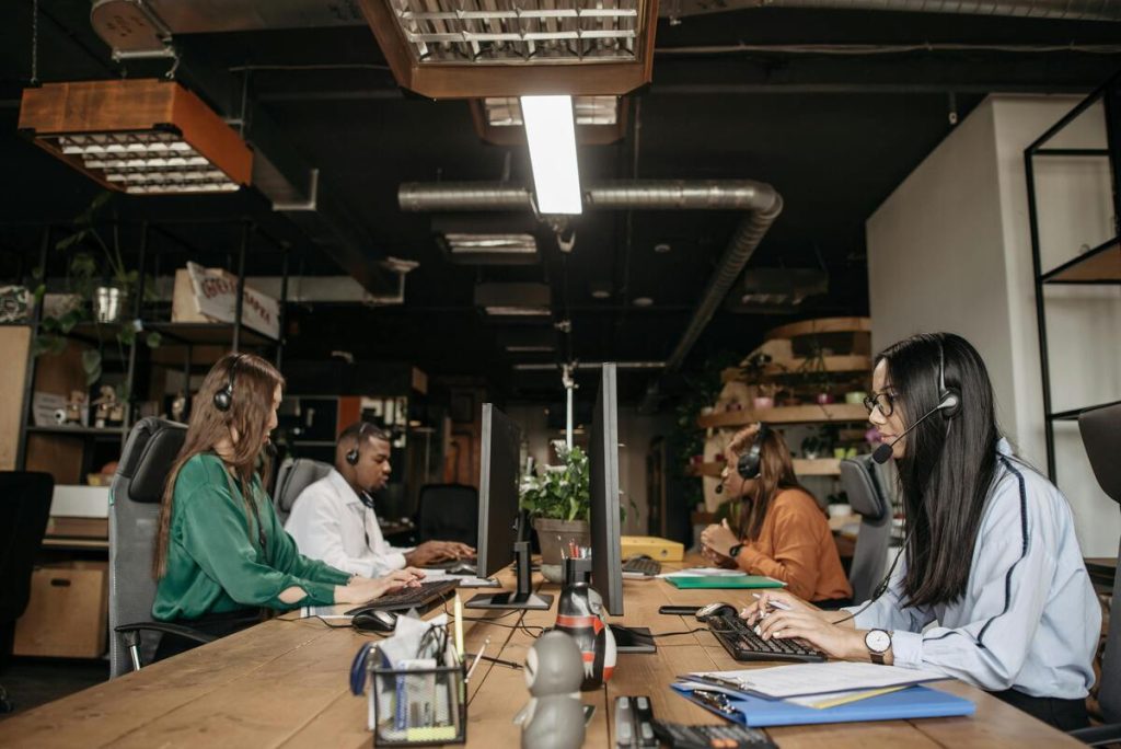 Call center agents taking calls with a cloud based call center solution