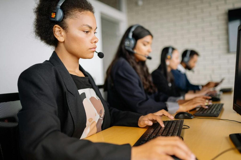 Customer success outsourcing team providing support while handling inbound and outbound calls