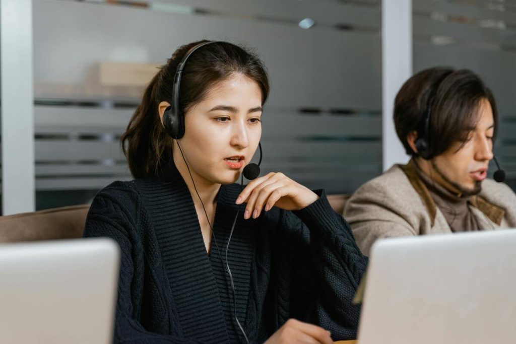 Call center agents serving as a point of contact for customer support inquiries