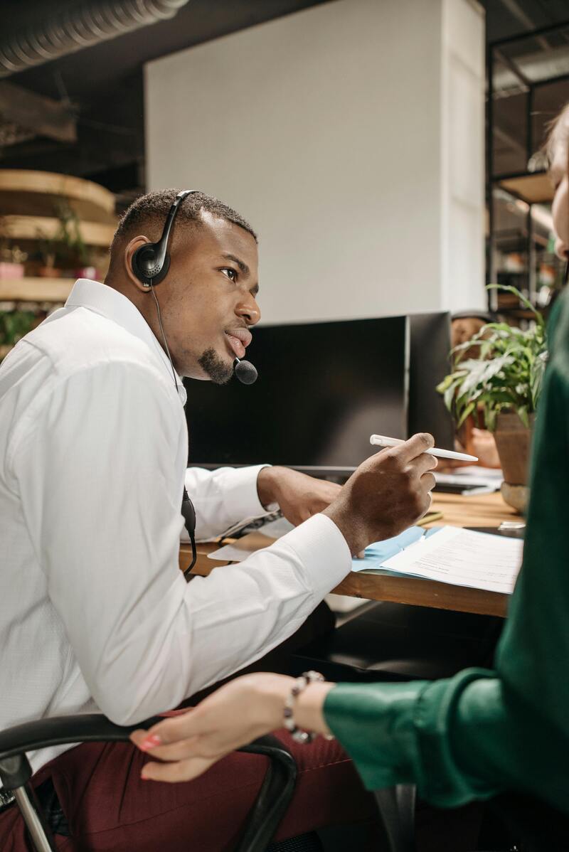 Customer service agents collaborating in a modern support center