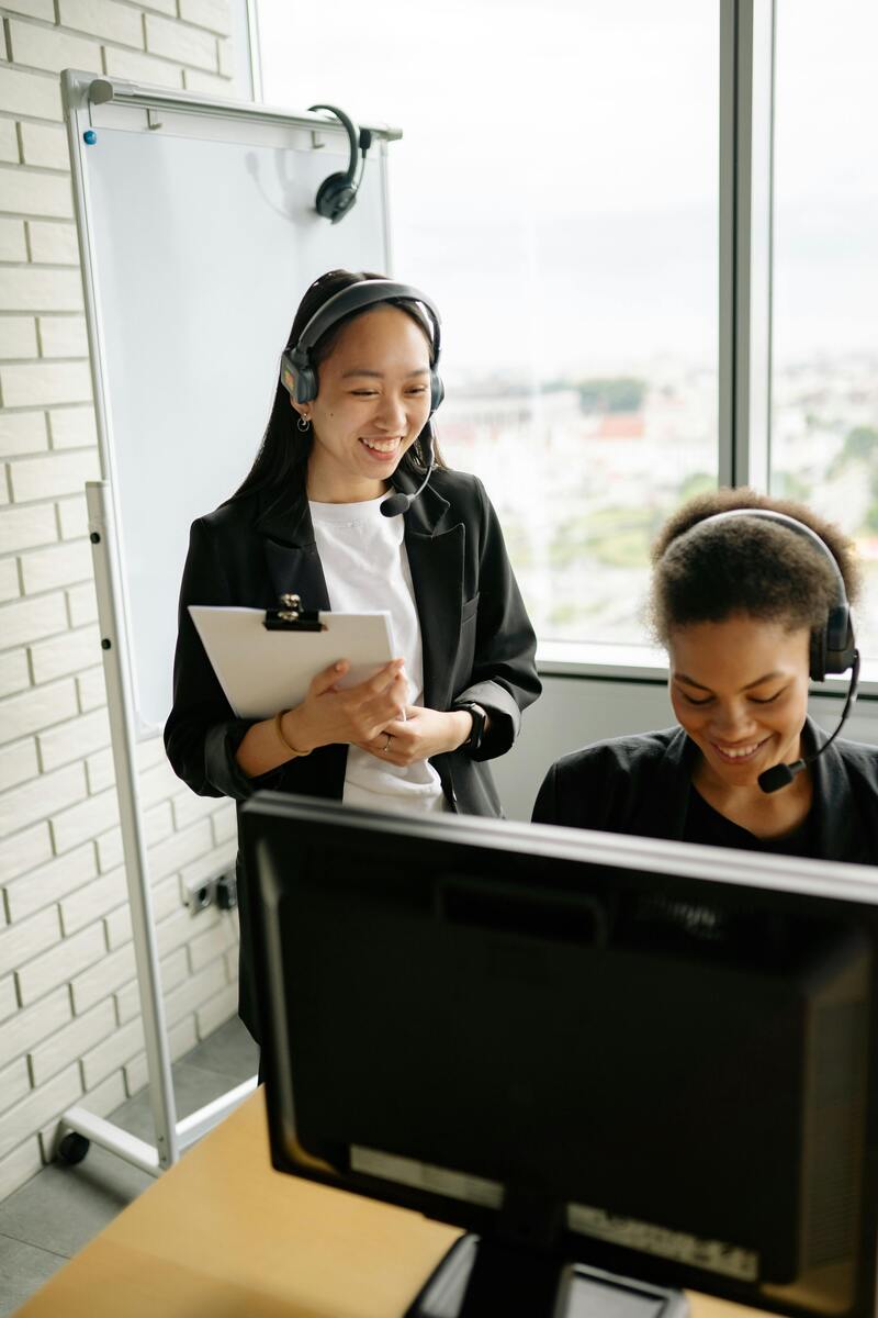 Customer service agents taking calls at a call center outsourcing company