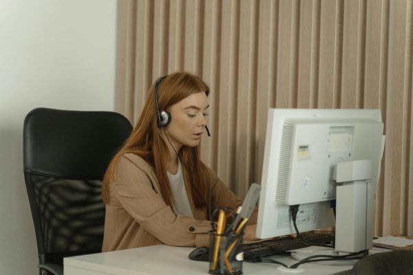 Customer service agents using an automated ticketing system to manage support requests