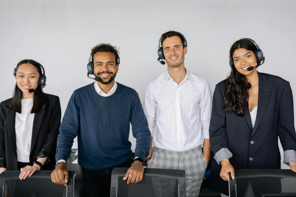 Customer service team working in a modern office while addressing the effects of poor customer service on business