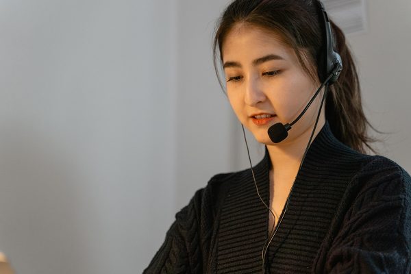 Call center outsourcing agent assisting customers professionally 