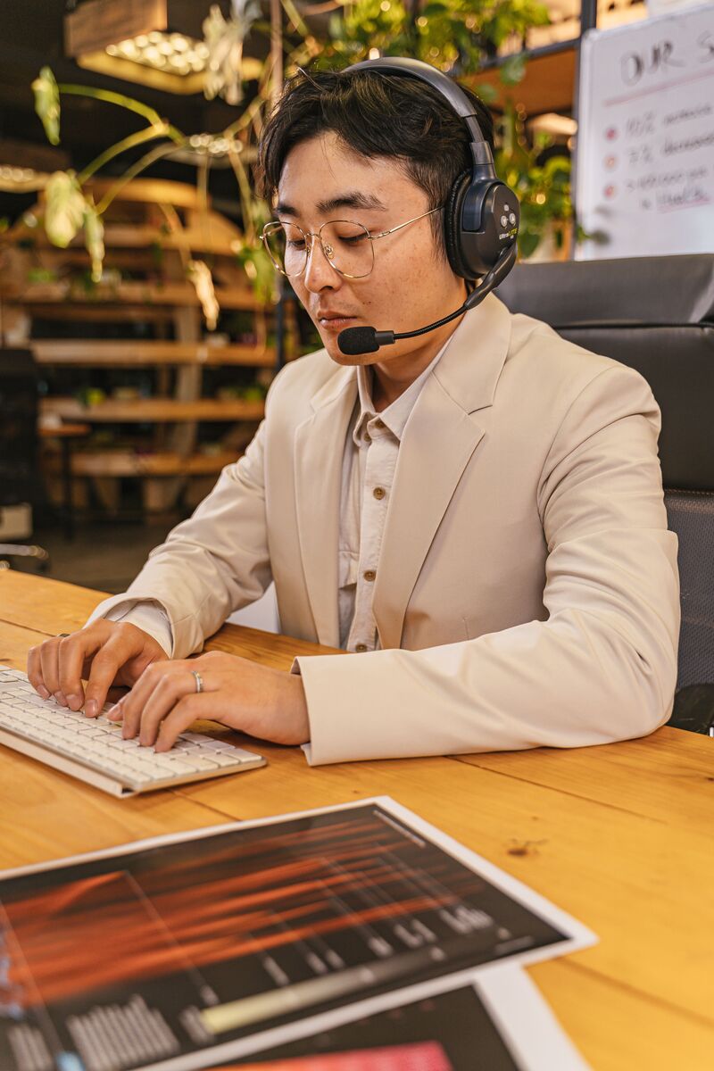 Customer support representative delivering call center services