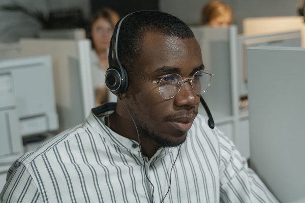 Customer service representative delivering workforce optimization support