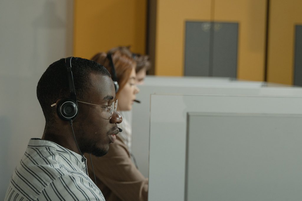 Outsourced phone support representative resolving customer concerns